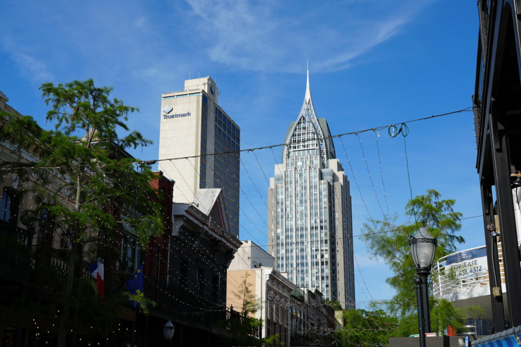 Art deco and modern towers rising over downtown streets