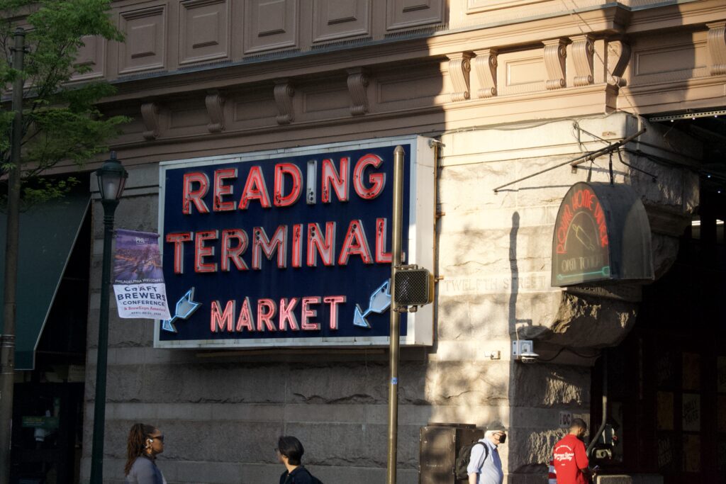 The neon Reading Terminal Market sign above the entrance