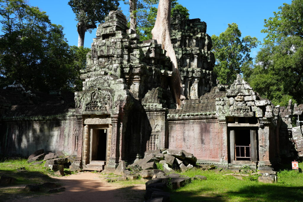 The stepped stone facade and doorways of a temple gate