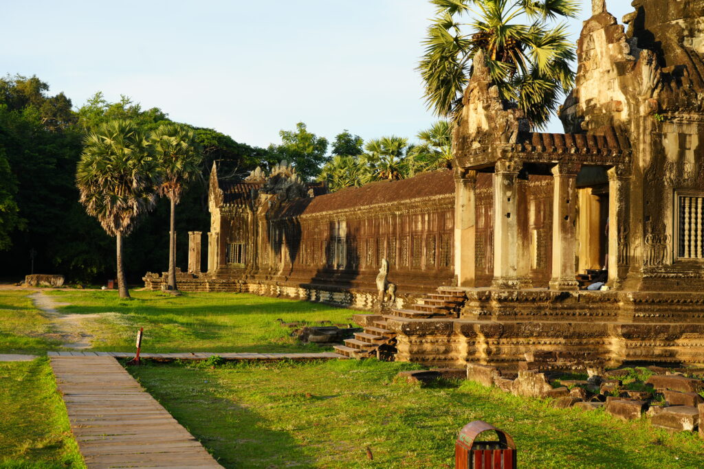 Warm early light raking across the outer gallery of Angkor Wat