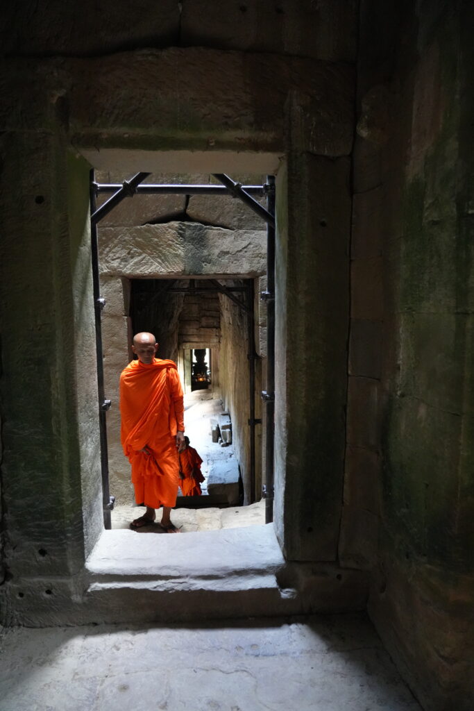 Monk in temple doorway