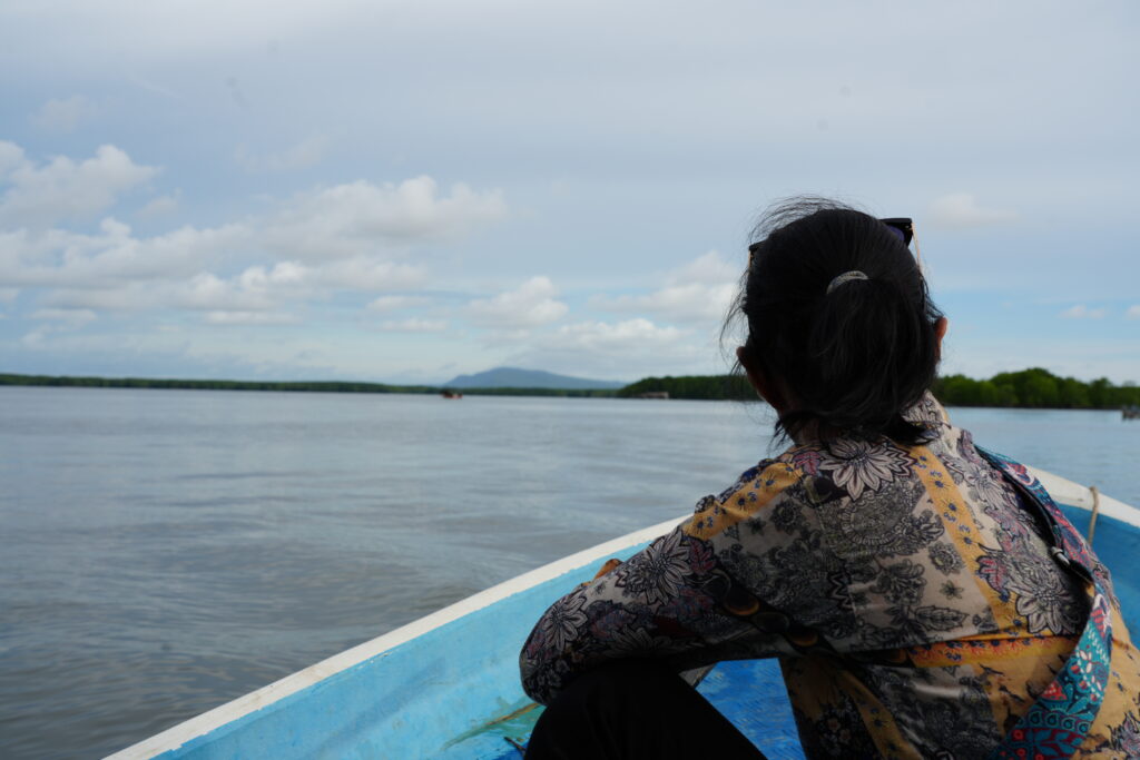 Woman gazing over water