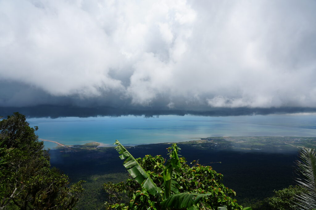 Storm band over turquoise gulf