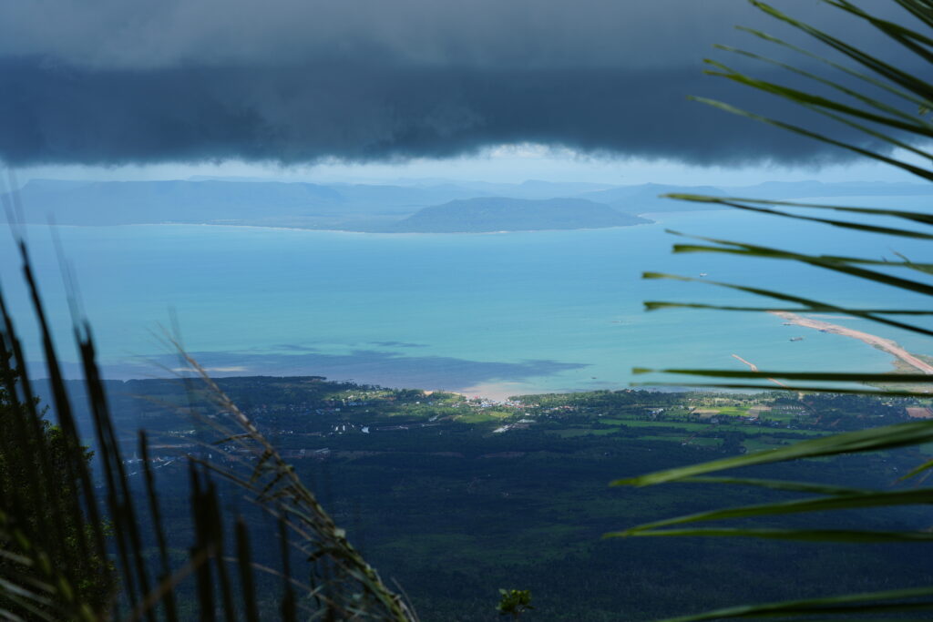 Storm cloud over turquoise coast