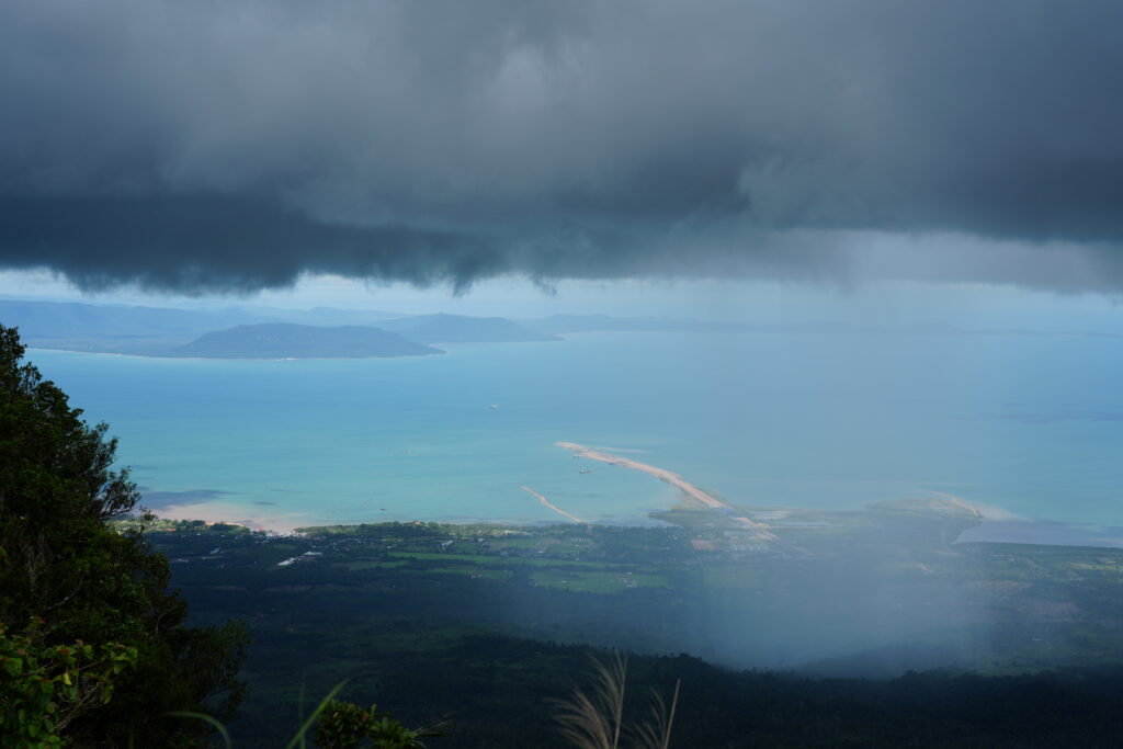 Rain curtain over coastal plain