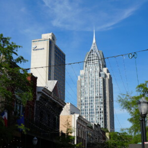 Art deco and modern towers rising over downtown streets