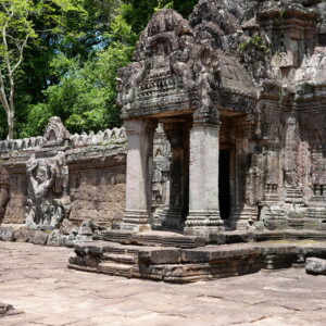 Columned stone pavilion and carved gallery at Preah Khan