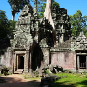 The stepped stone facade and doorways of a temple gate