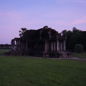 The north library building beneath a violet and pink dawn sky